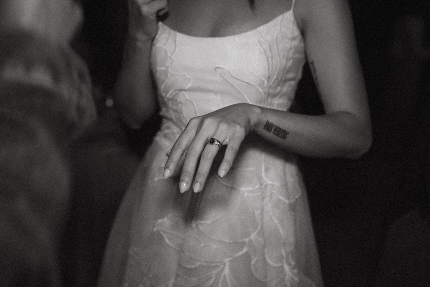 Bride shows off ring on her wedding day