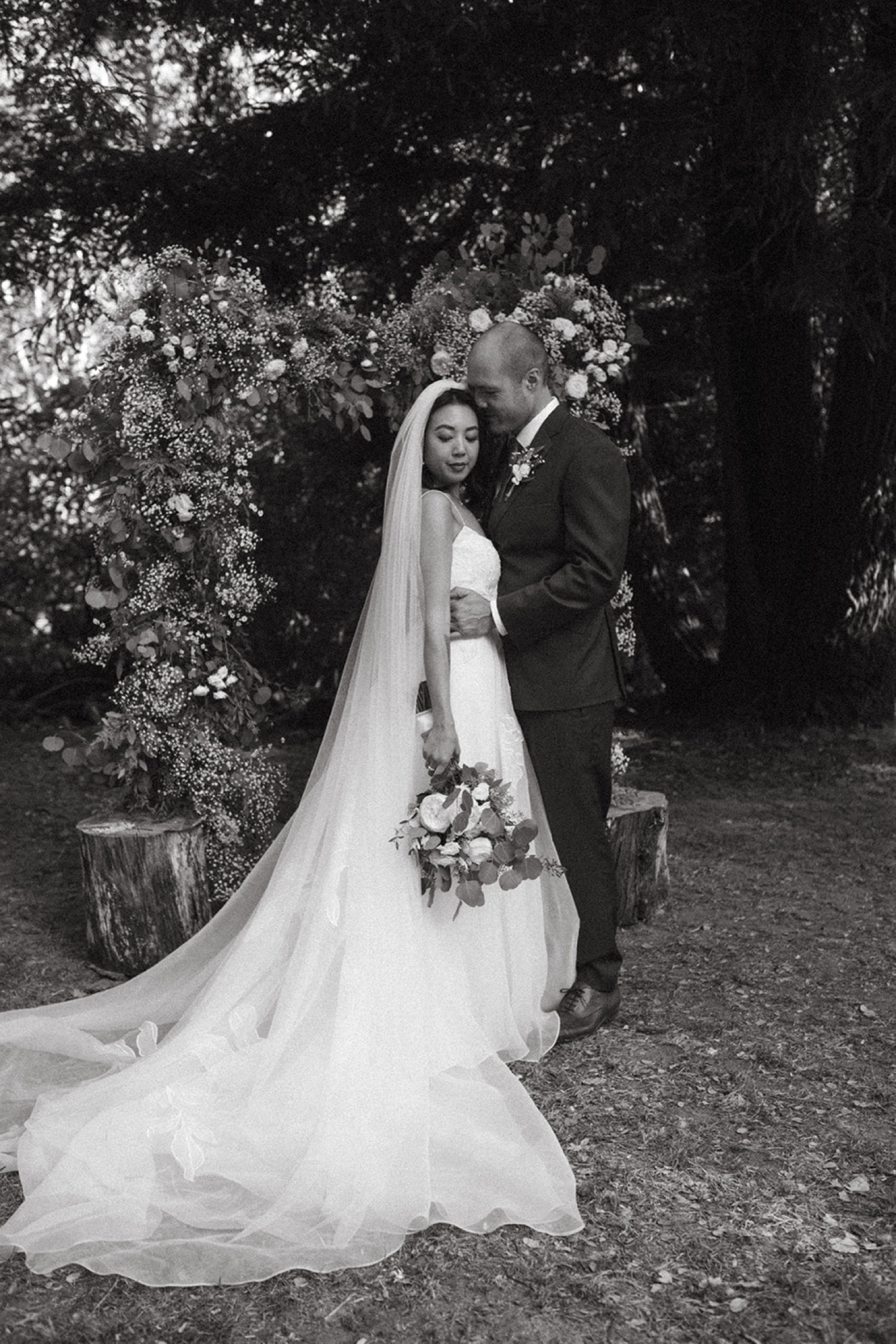 Bride and groom pose on their wedding day in Bay Area.