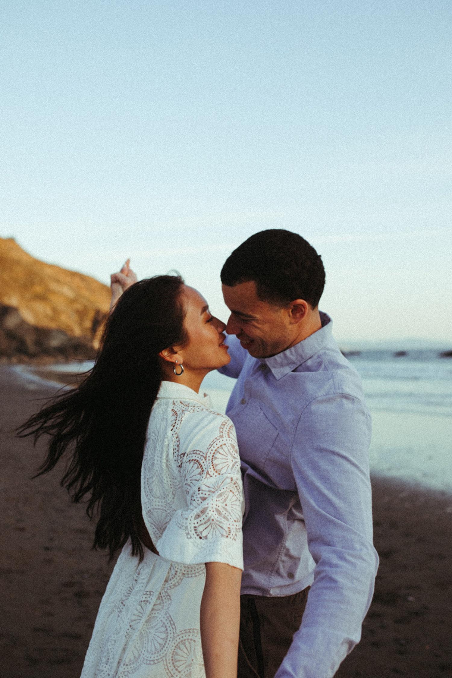 Couple kiss during their engagement photos in Bay Area.