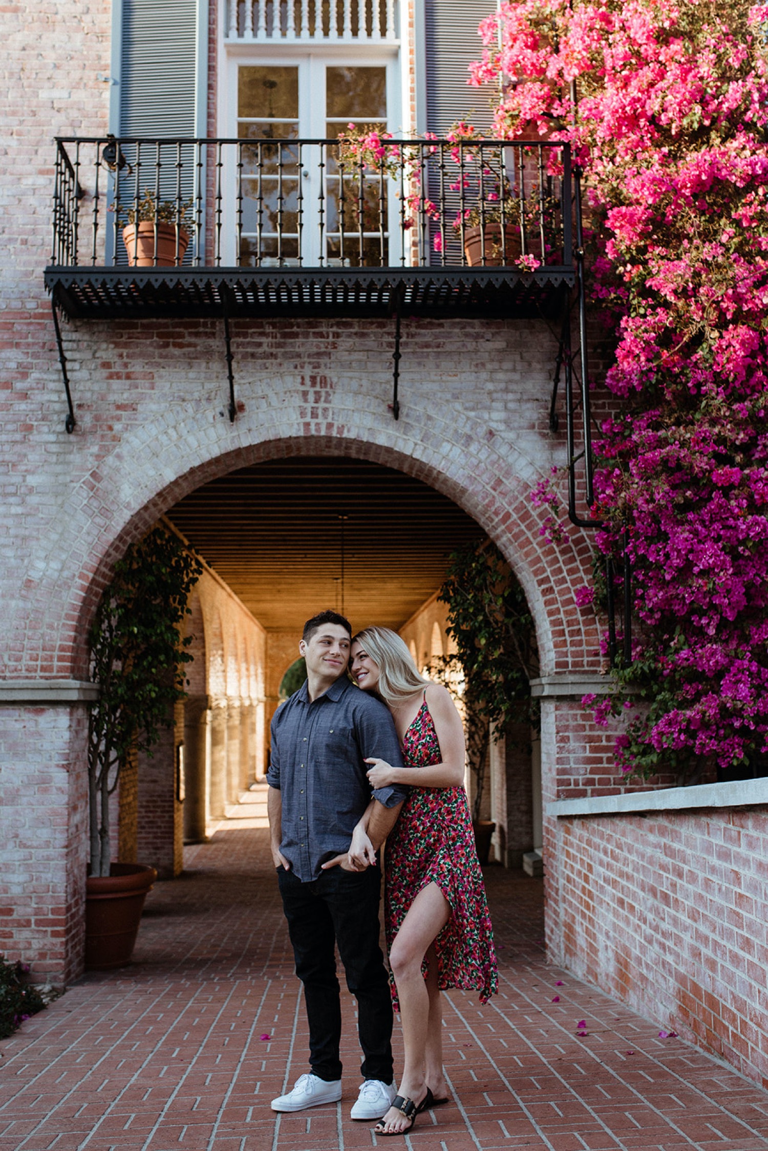 Couple pose for engagement photos.